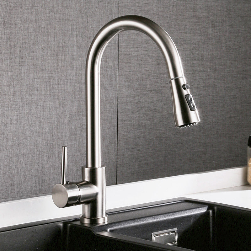 Shopi Vella brushed copper kitchen faucet with a high arc and single lever handle above black sink