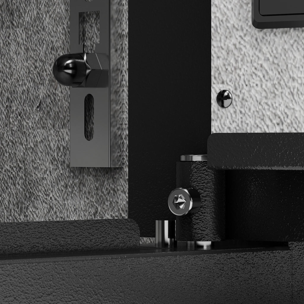 Close-up of Shopi Vella business cash deposit safe lock mechanism in black and silver