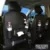 Shopi Vella car seat back storage bag installed on black car seats for organized travel storage
