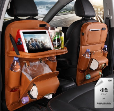 Shopi Vella brown car seat back storage bag with multiple compartments holding tablet and bottles