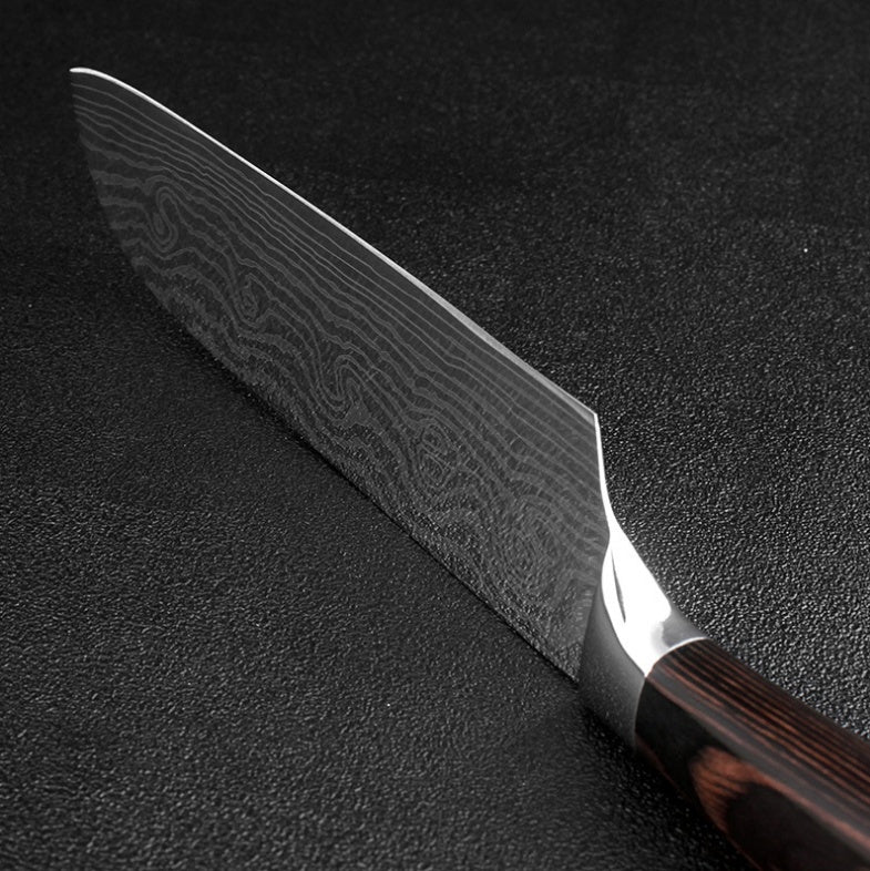 Shopi Vella carpenter's chef knife 8 piece with patterned blade and wooden handle on black surface