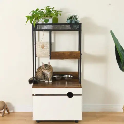 Modern cat litter box enclosure furniture with upper shelves, plants, and a cat sitting on wooden surface