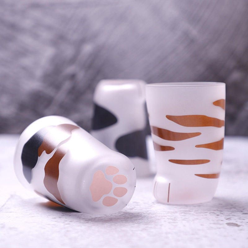 Shopi Vella cat paw tumbler gift with frosted glass and paw print design in brown and black