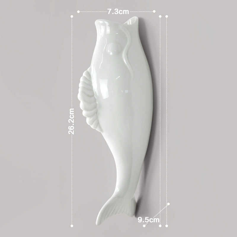 White ceramic goldfish wall vase with smooth finish and dimensions displayed for home storage decor