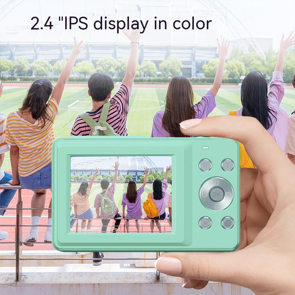 Shopi Vella children's HD camera gift in mint green with 2.4 inch IPS color display showing four kids waving outdoors