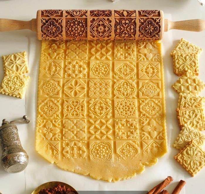 Shopi Vella Christmas embossing rolling pin creating detailed embossed patterns on cookie dough