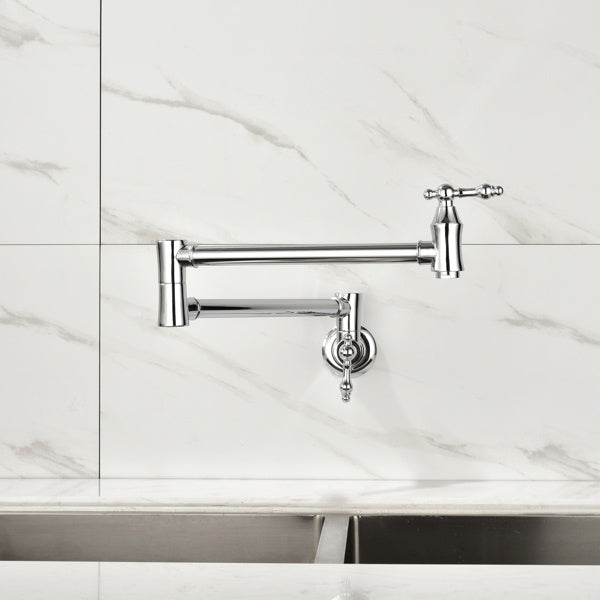 Shopi Vella folding kitchen faucet in chrome mounted on marble wall above stainless steel sink