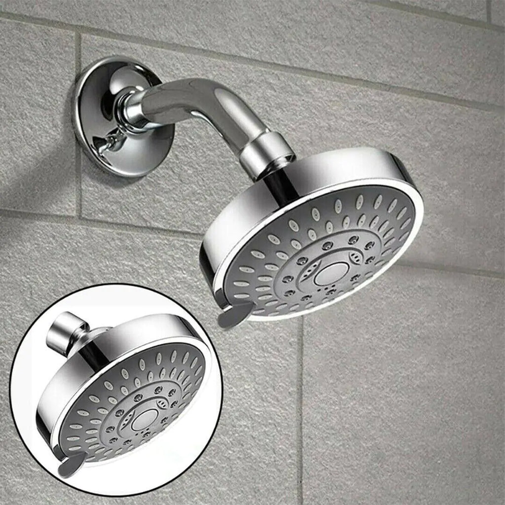 Chrome high pressure handheld shower head mounted on tiled bathroom wall with multiple spray settings