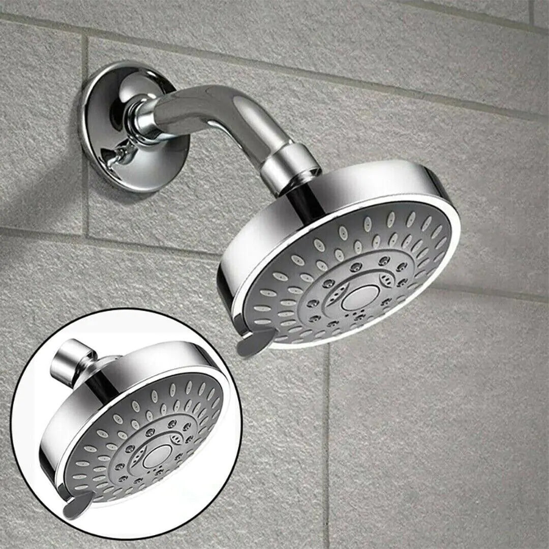 Chrome high pressure handheld shower head mounted on tiled bathroom wall with multiple spray settings
