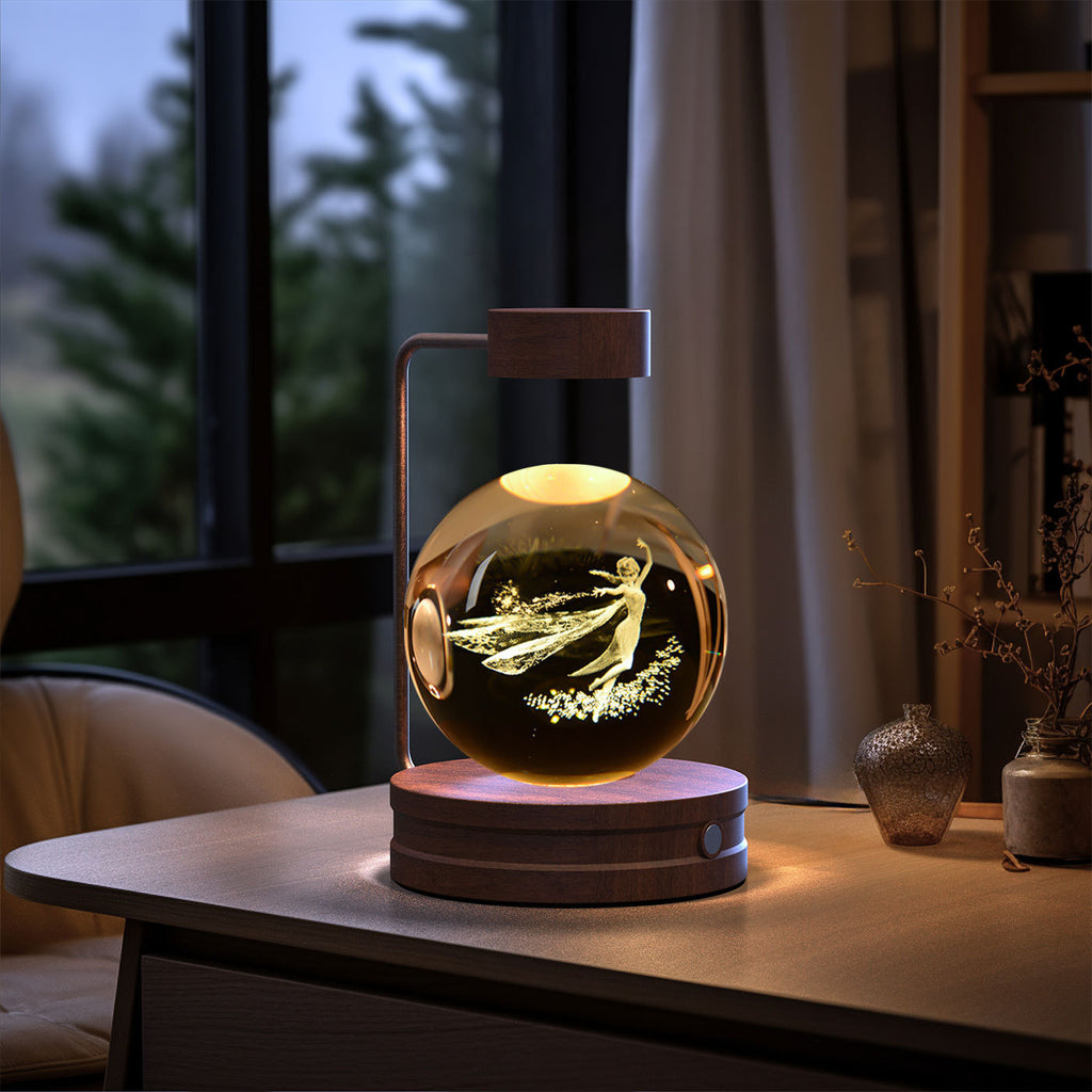 Shopi Vella birthday gift crystal ball lamp with fairy design on wooden base on desk