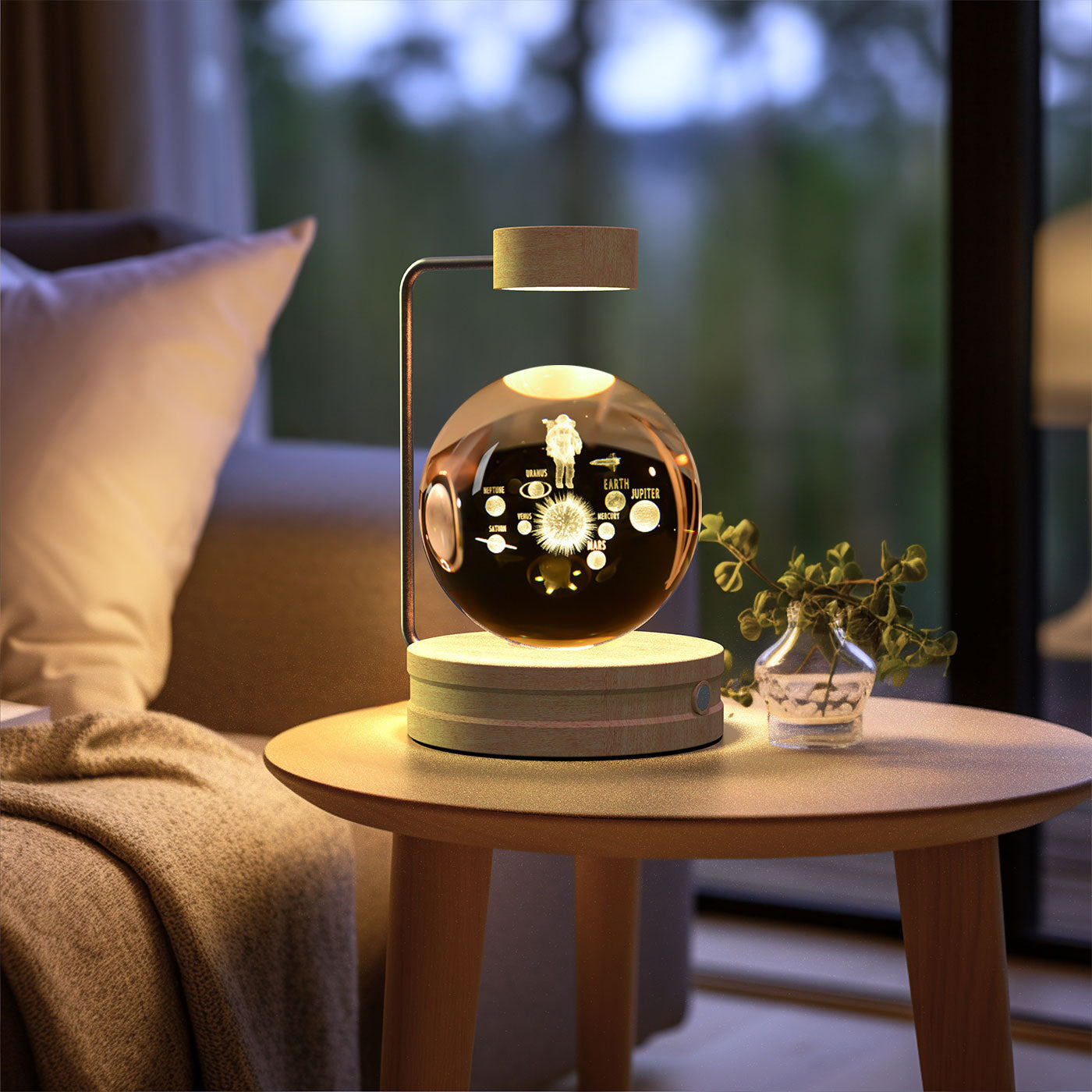 Shopi Vella birthday gift crystal ball lamp glowing on wooden table in cozy living room