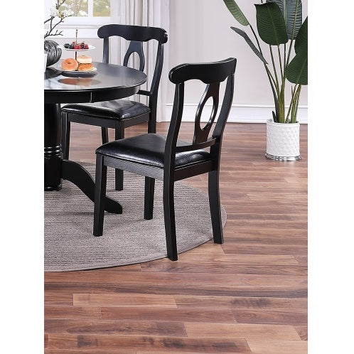 Shopi Vella classic 5 piece dining room furniture set with black round table and matching chairs on wooden floor