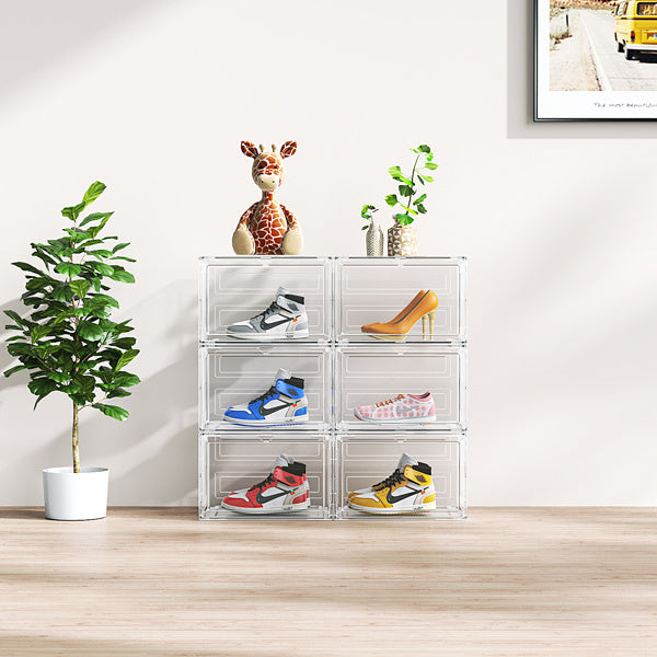 Large acrylic shoebox organizer holding various sneakers and a high heel shoe in a modern room