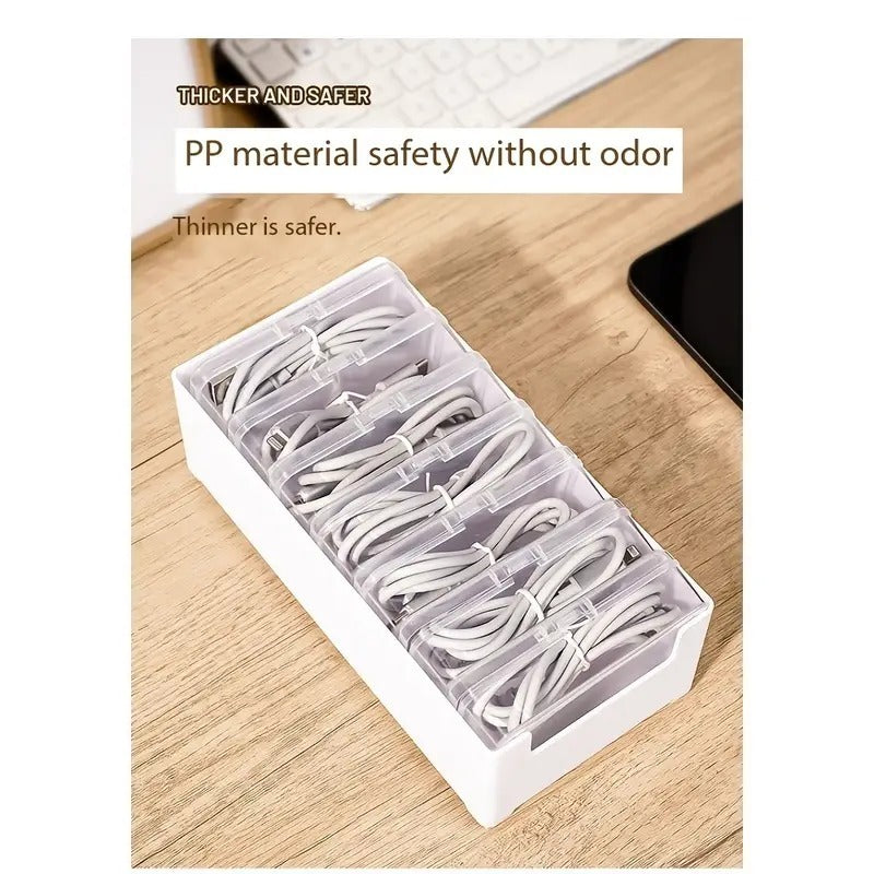 Shopi Vella clear plastic storage box set organizing multiple white cables on wooden surface