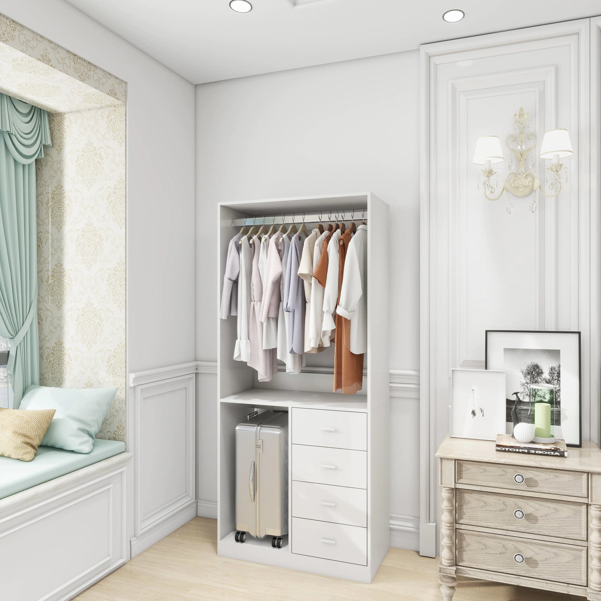 White closet organizer with hanging rod holding clothes and drawers with suitcase storage below