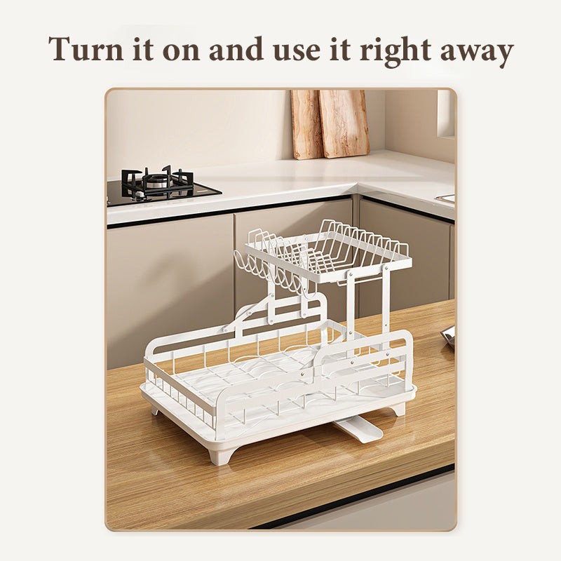White collapsible kitchen dish rack on wooden countertop in modern kitchen for efficient dish drying