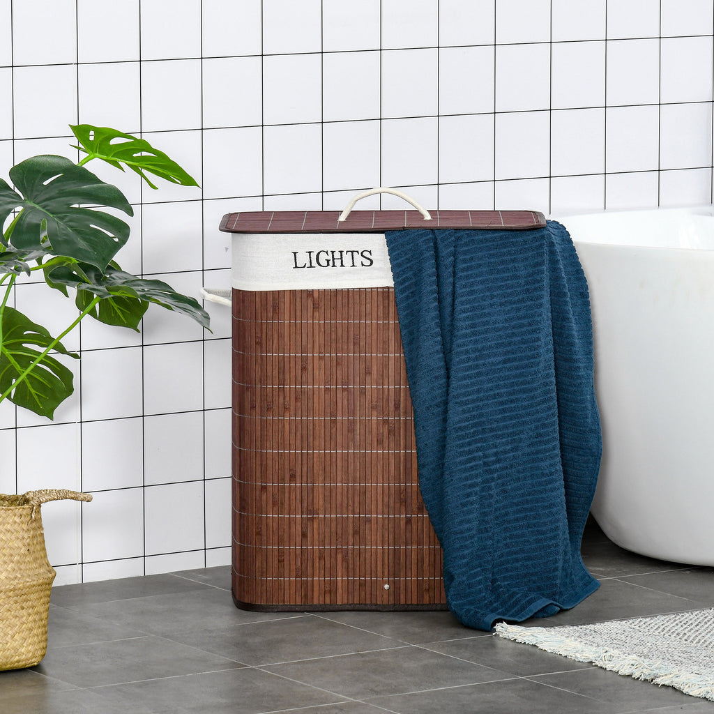 Shopi Vella collapsible laundry hamper with removable bags in brown with white label and blue towel beside bathtub