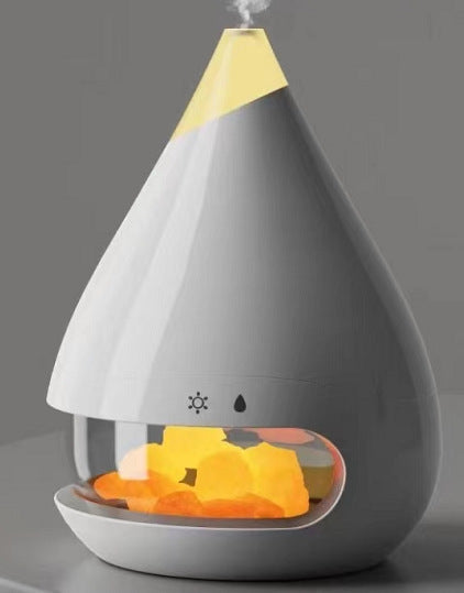 Shopi Vella colorful atmosphere lamp humidifier in white teardrop shape with glowing orange salt crystals