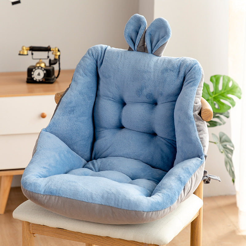 Comfortable seat cushion for home office in blue with soft plush fabric and ergonomic design on wooden chair