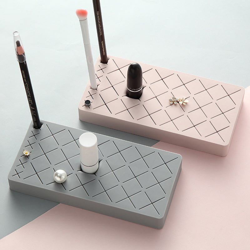 Shopi Vella compact lipstick holder for dressing table in pink and gray with slots for makeup brushes and accessories