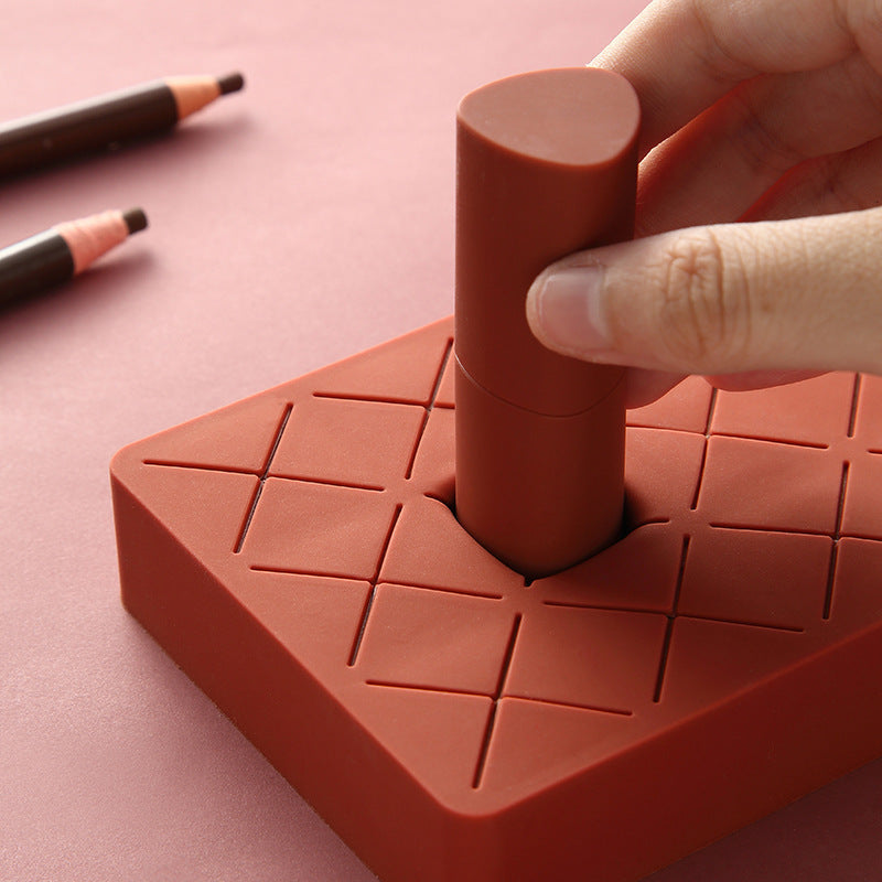 Shopi Vella compact lipstick holder for dressing table in terracotta color with geometric design