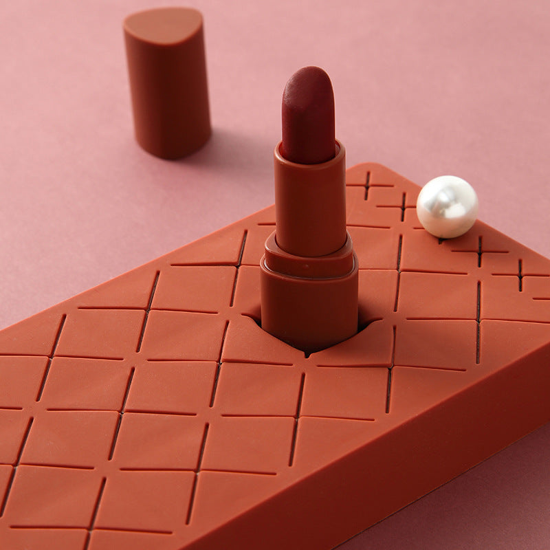 Shopi Vella compact lipstick holder for dressing table in terracotta with textured surface and pearl detail