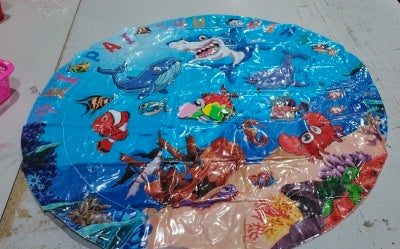 Shopi Vella cooling pet bed for summer featuring colorful underwater sea life design
