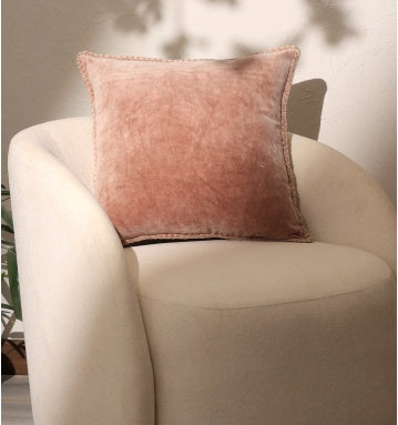 Shopi Vella cotton decorative pillow 19x19 inch in soft pink on beige chair