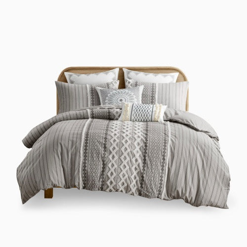 Shopi Vella cotton duvet cover set queen in gray with decorative patterns and matching pillows on bed