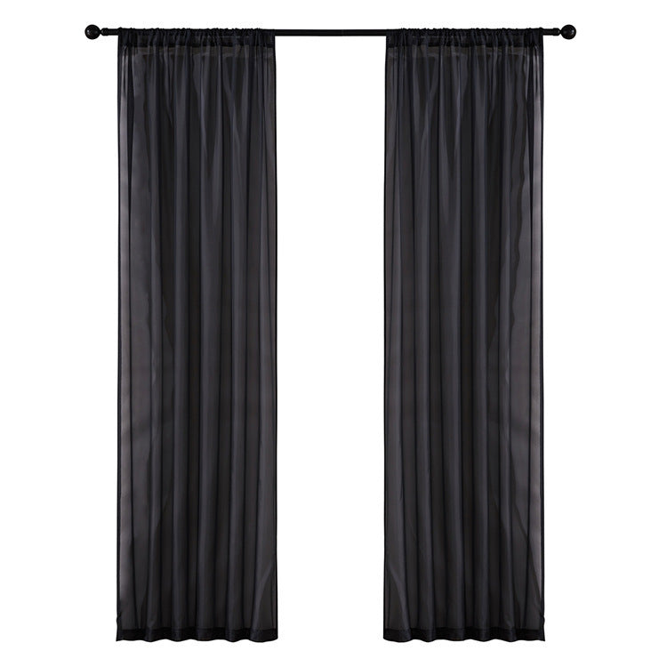 Shopi Vella black cotton linen window curtains hanging on a black curtain rod