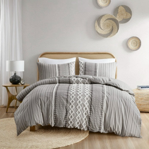 Shopi Vella cotton duvet cover set queen with gray geometric pattern on a wooden bed