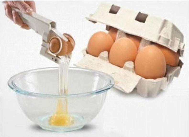 Shopi Vella creative egg shell separator removing yolk from egg over glass bowl kitchen storage tool