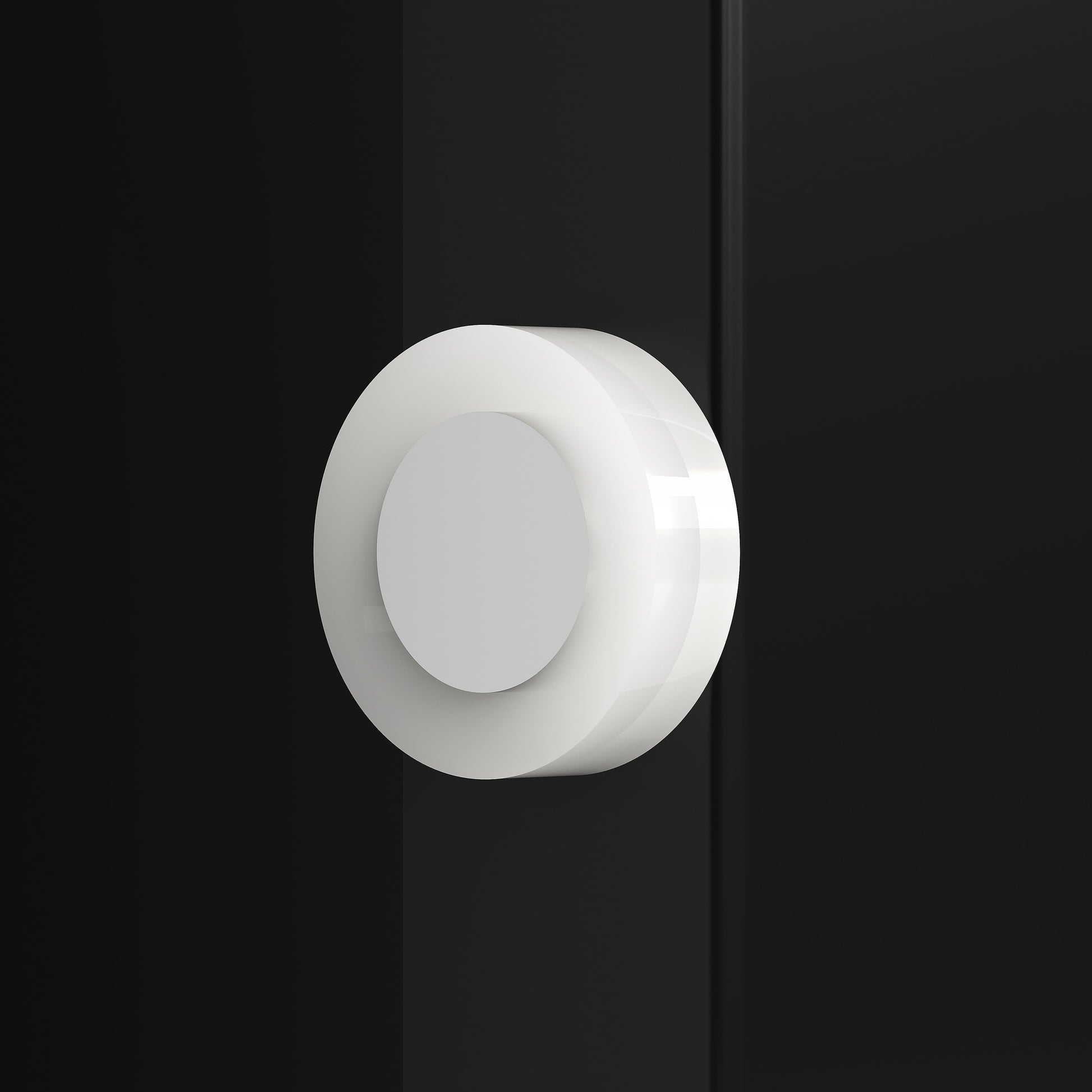 White round knob handle on a black weather resistant steel package mailbox by Shopi Vella
