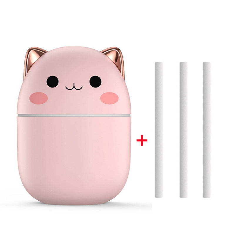 Shopi Vella cute cat air humidifier in pink with gold ears and three replacement wicks