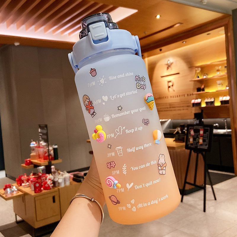 Shopi Vella cute water bottle with straw in gradient blue and peach colors with motivational time markers