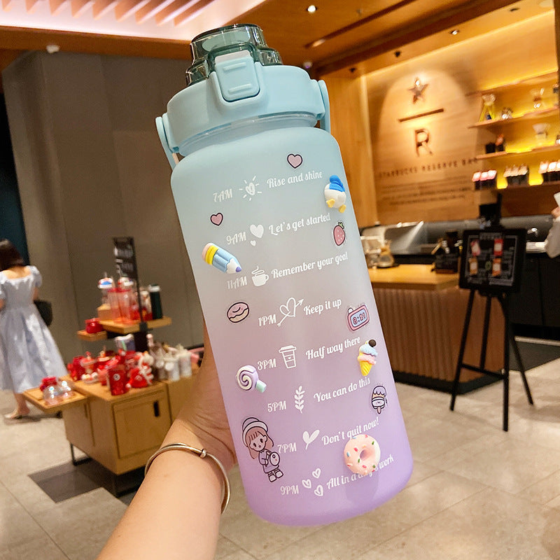Shopi Vella cute water bottle with straw in pastel purple and blue with motivational time markers