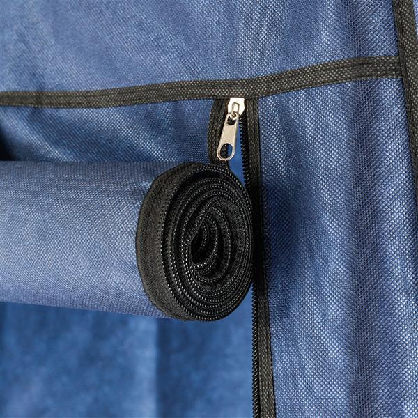 Close-up of Shopi Vella dark blue fabric wardrobe showing rolled-up fabric cover with zipper