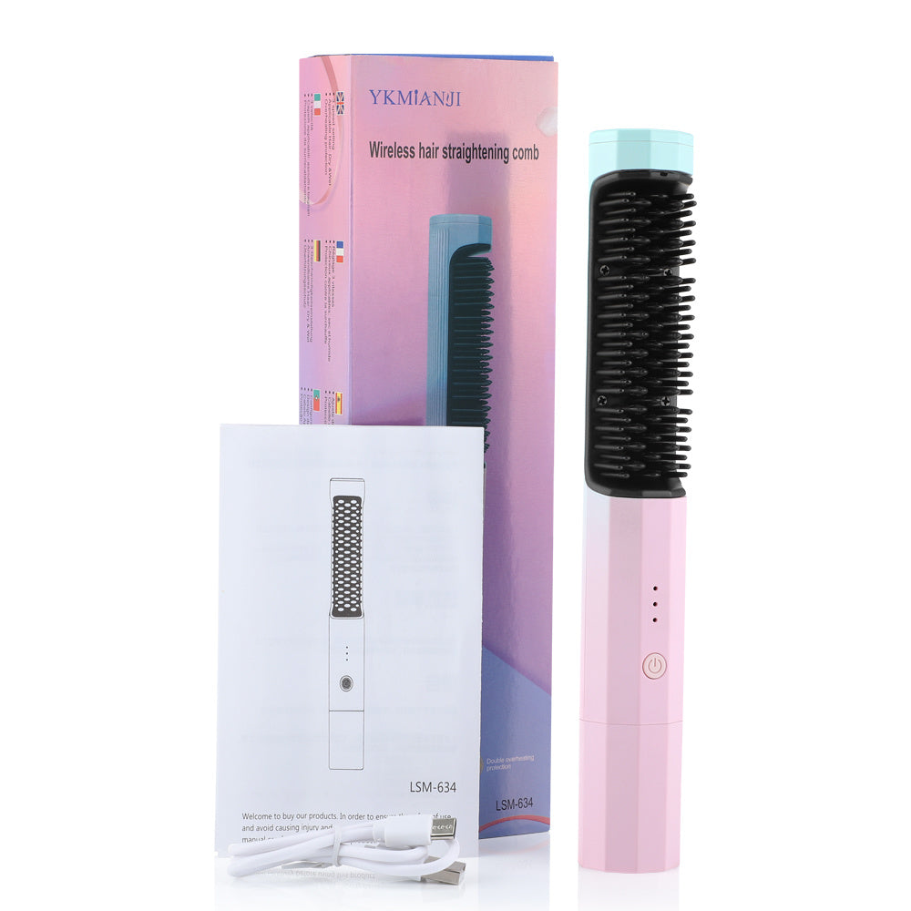 Rechargeable hair straightening comb in pink with black bristles plus USB charging cable and user manual