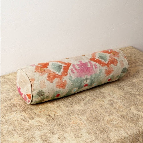 Shopi Vella decorative bolster pillow case with colorful abstract pattern on beige background