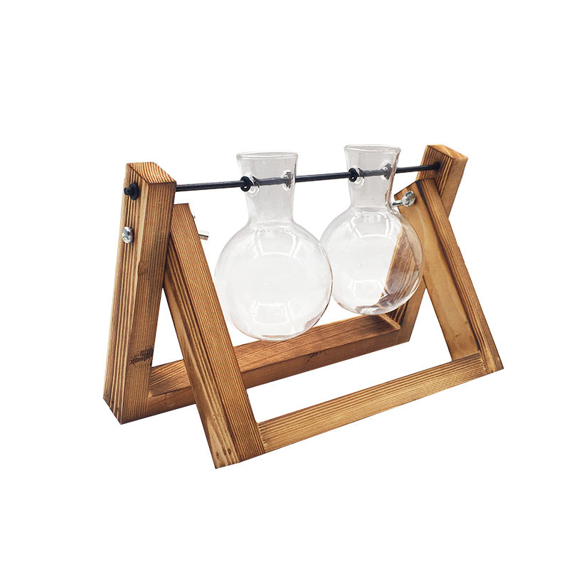 Shopi Vella decorative glass vase for indoor plants with two clear glass jars held by a wooden frame