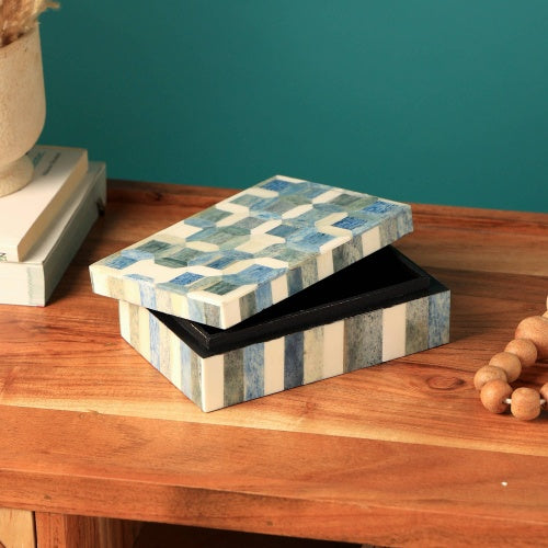 Shopi Vella decorative storage box with blue and white geometric pattern on wooden table