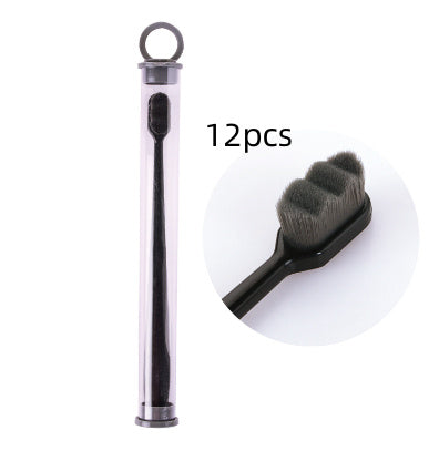 Shopi Vella deep cleaning toothbrush for travel in black with soft bristles and clear storage tube
