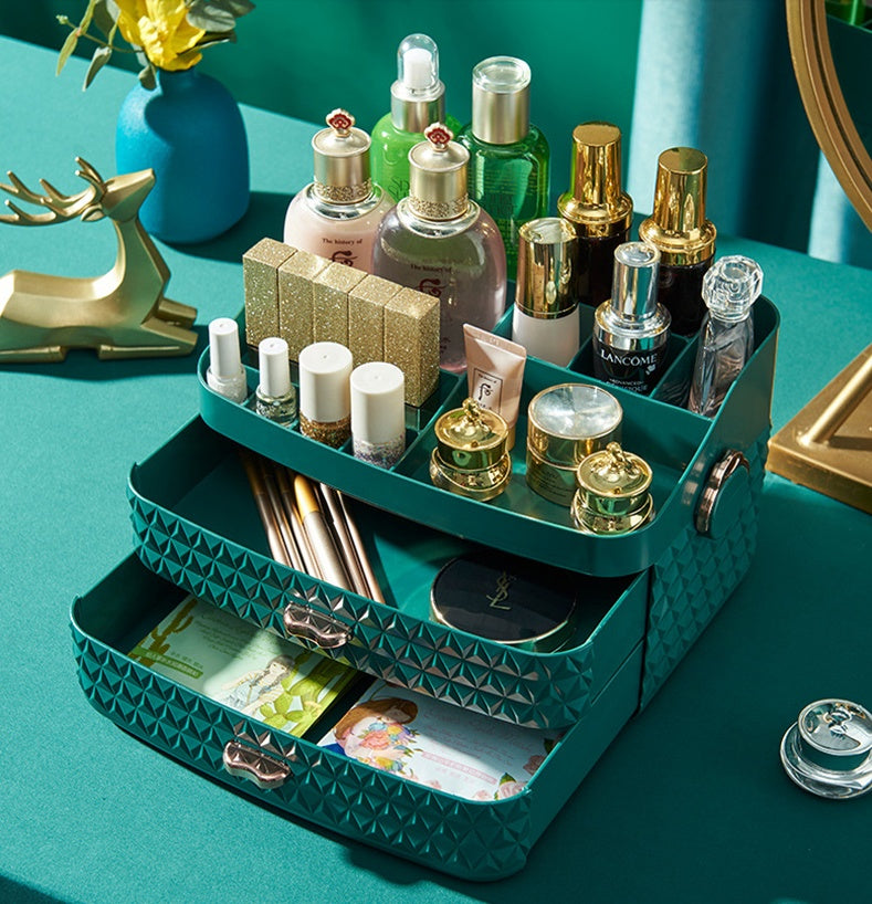 Shopi Vella desktop cosmetics storage box in teal with multiple compartments holding beauty products