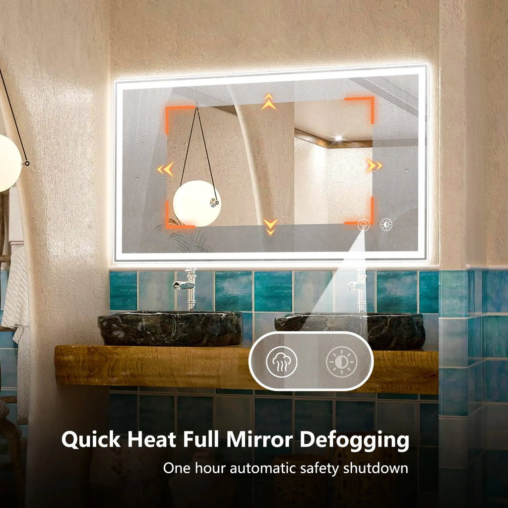 Dimmable LED bathroom mirror with quick heat full mirror defogging feature installed above double sinks