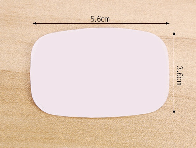 Shopi Vella disposable hand soap paper measuring 5.6 cm by 3.6 cm on a wooden surface