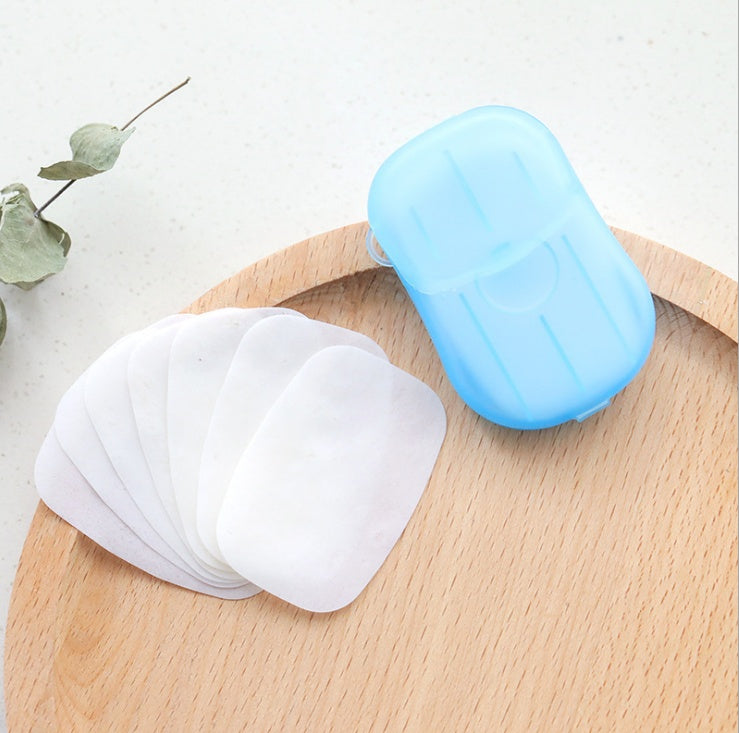 Shopi Vella disposable hand soap paper with blue compact storage case on wooden surface