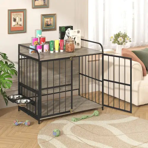 Black metal and wood dog crate furniture with feeding station and open door in living room