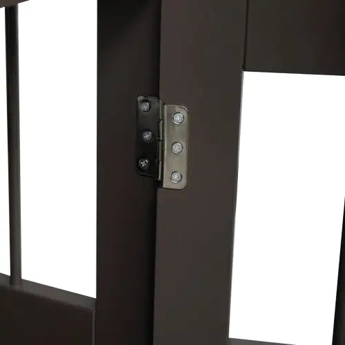 Close-up of metal hinge detail on brown wooden dog kennel end table door frame