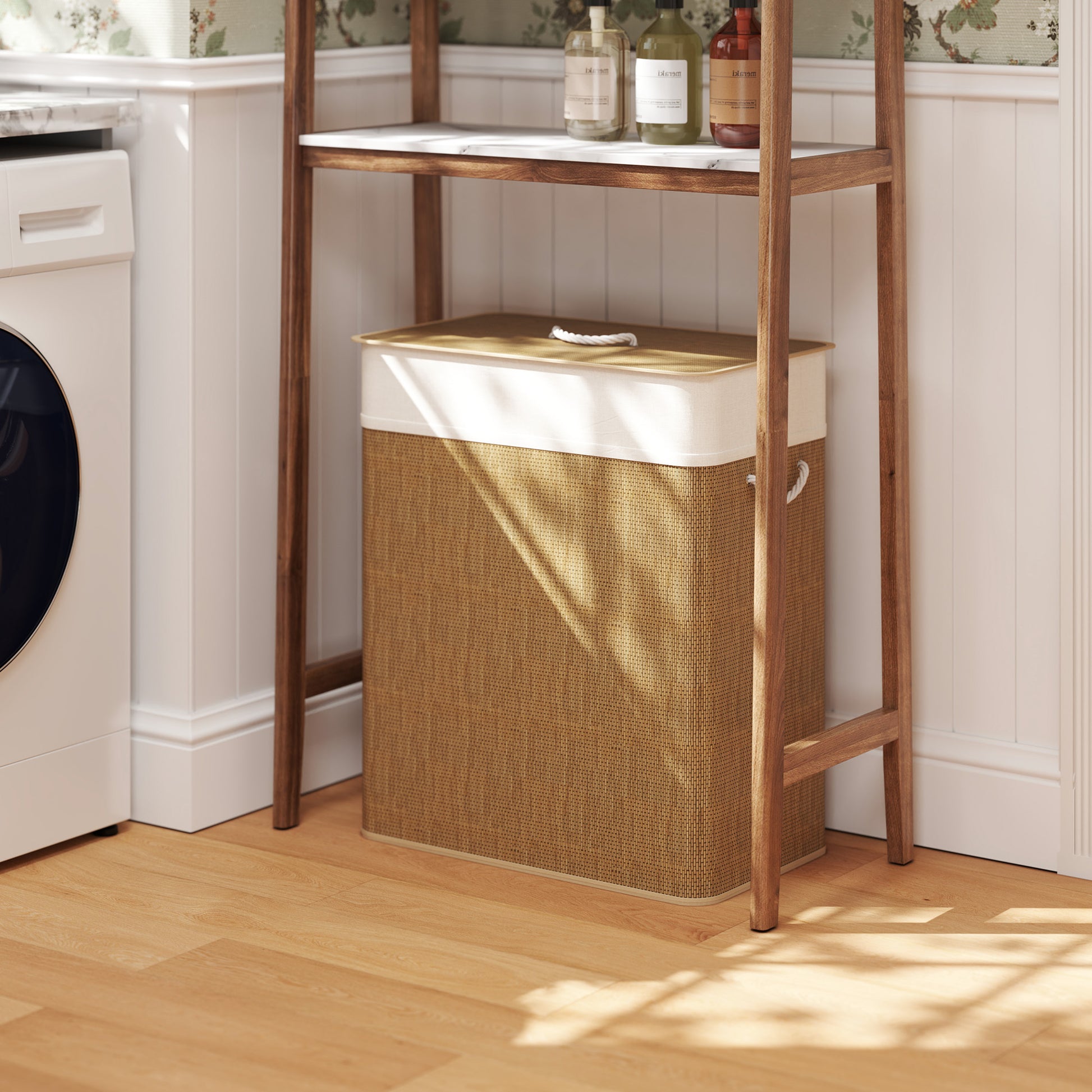 Shopi Vella double laundry basket with lid in woven design placed under wooden shelf in laundry room