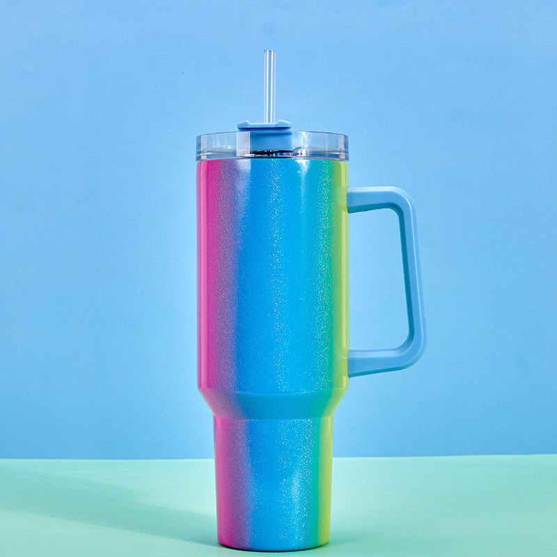 Shopi Vella double-layer stainless steel cup with glittery rainbow finish and blue handle with straw
